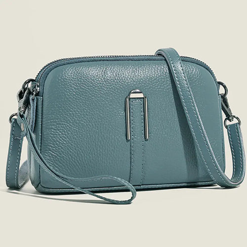 Schultertasche aus Leder als Clutch